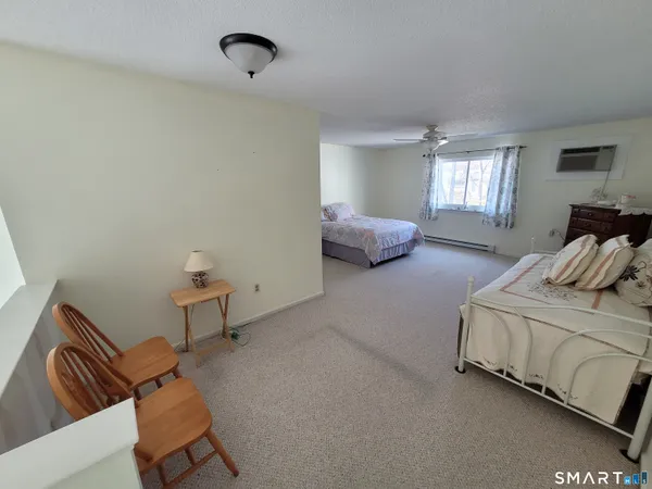 a bedroom with a bed and closet