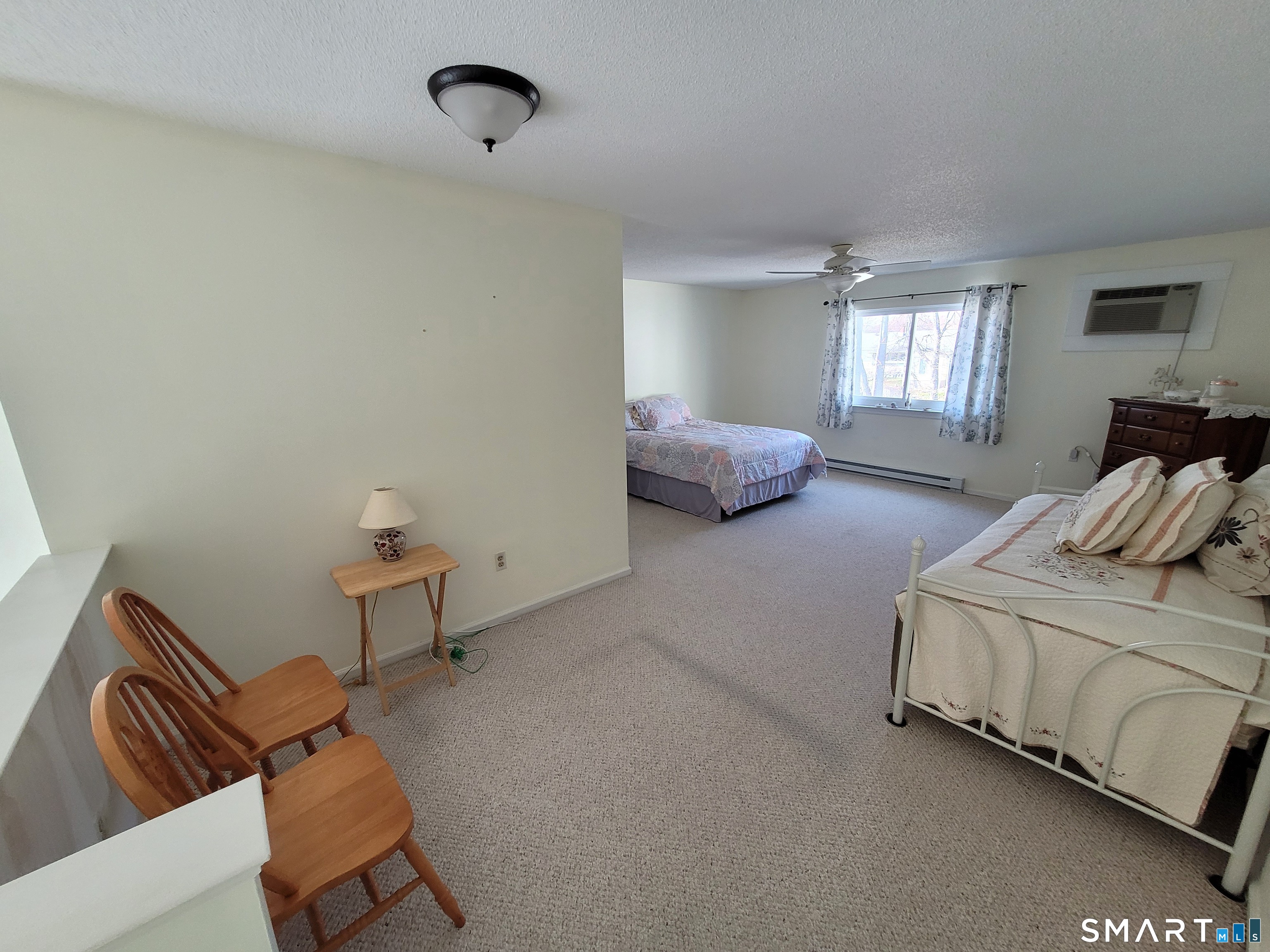 35 Ruth Street, Unit 44 Bristol, CT 06010 - Photo 18 of 35 a spacious bedroom with a bed and window