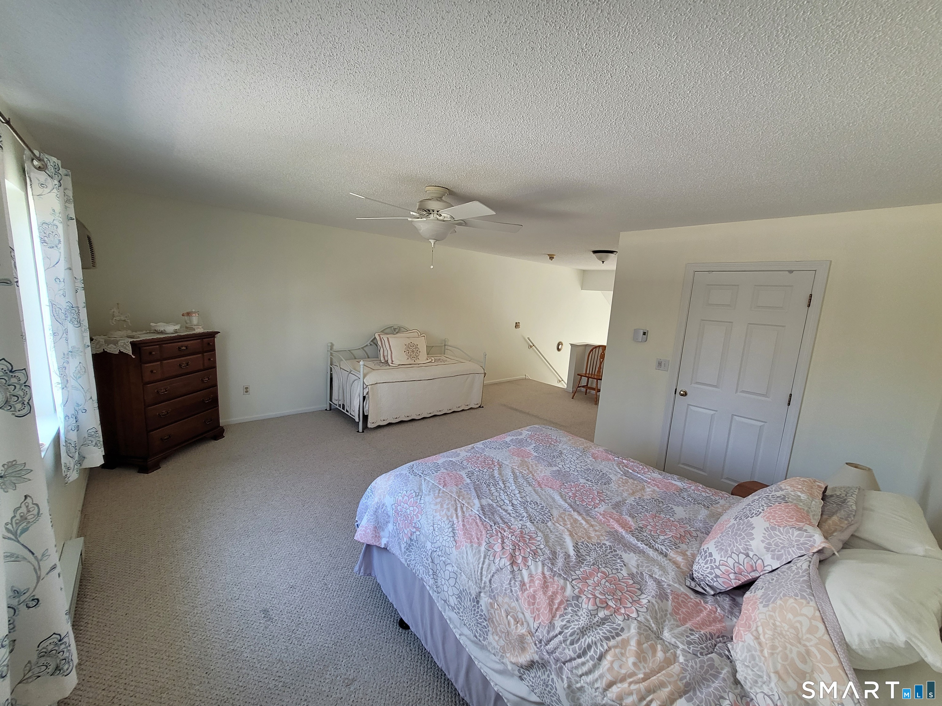 35 Ruth Street, Unit 44 Bristol, CT 06010 - Photo 19 of 35 a bedroom with a bed and closet