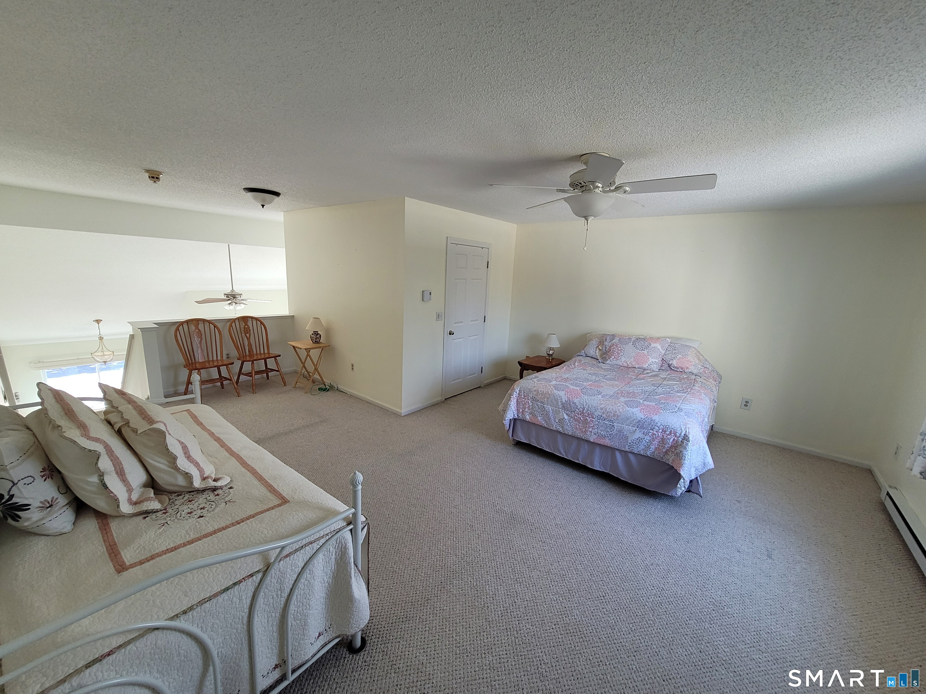 35 Ruth Street, Unit 44 Bristol, CT 06010 - Photo 20 of 35 a living room with furniture and a table