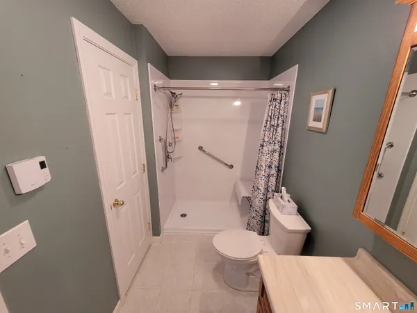 a room with storage and a sink