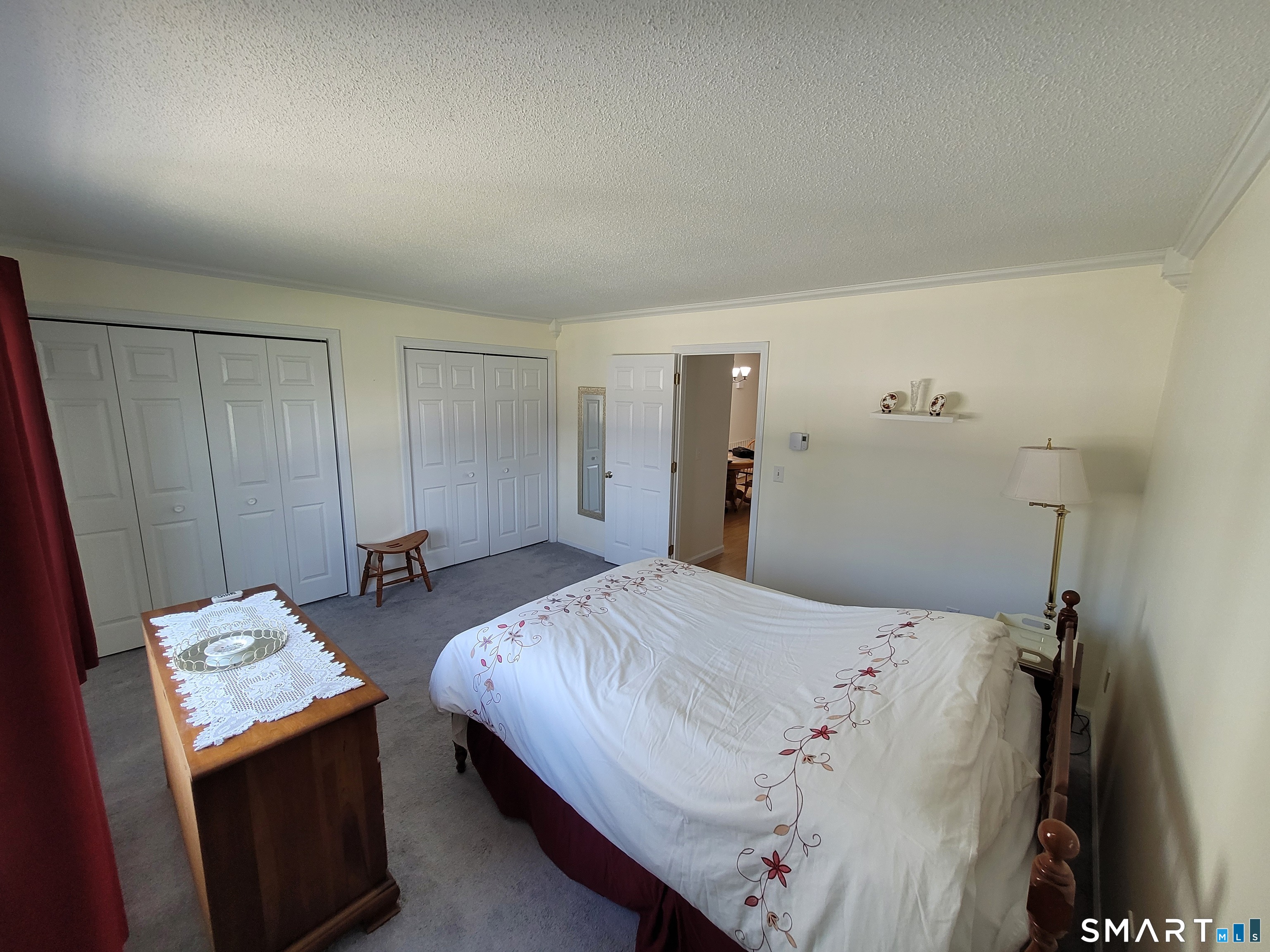 35 Ruth Street, Unit 44 Bristol, CT 06010 - Photo 27 of 35 a bedroom with bed and a closet