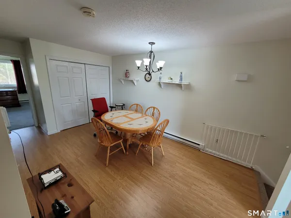 a view of a dining room with furniture
