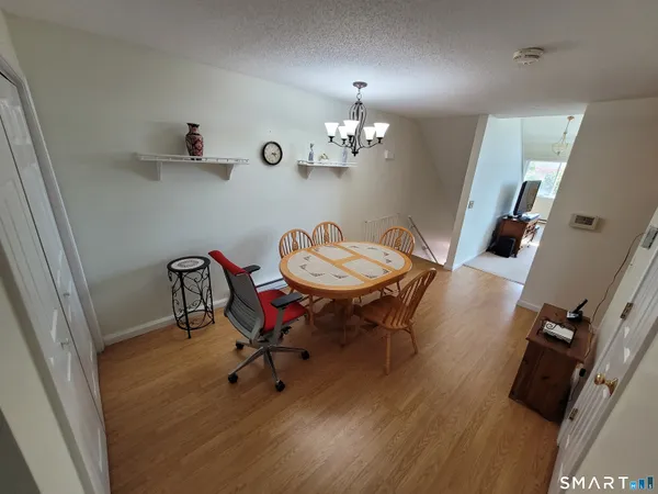 a kitchen with stainless steel appliances a refrigerator sink and cabinets