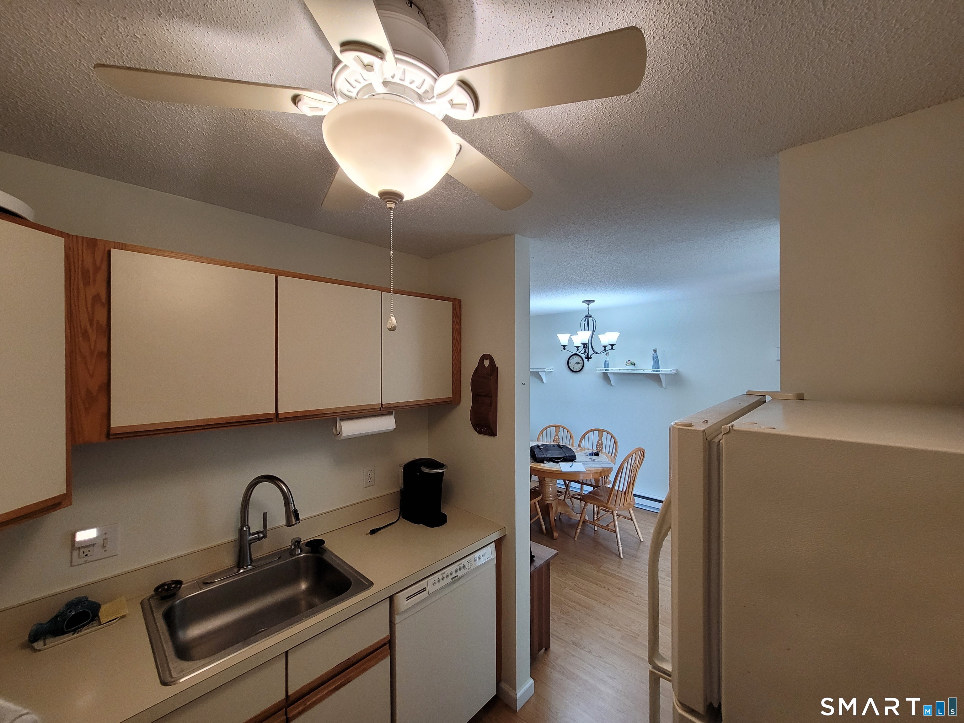 35 Ruth Street, Unit 44 Bristol, CT 06010 - Photo 9 of 35 a kitchen with a sink cabinets and appliances