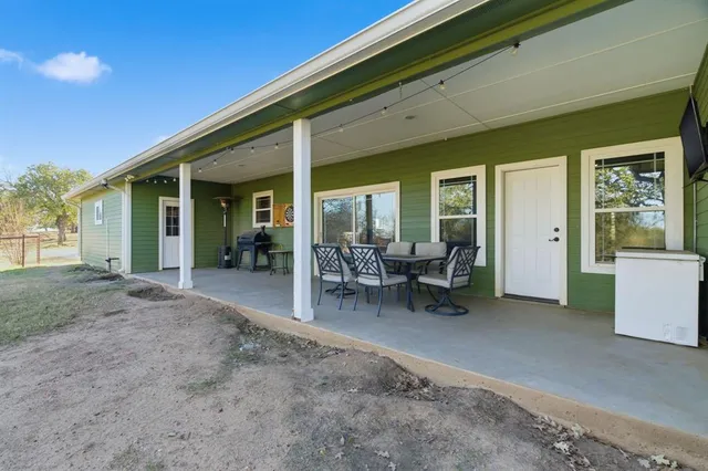 a view of a lobby with chair and tables