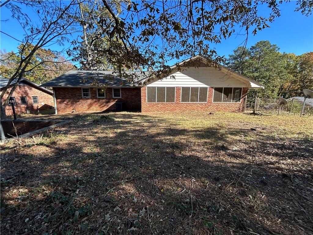 4315 York Road Atlanta, GA 30337 - Photo 4 of 24 a front view of a house with a yard