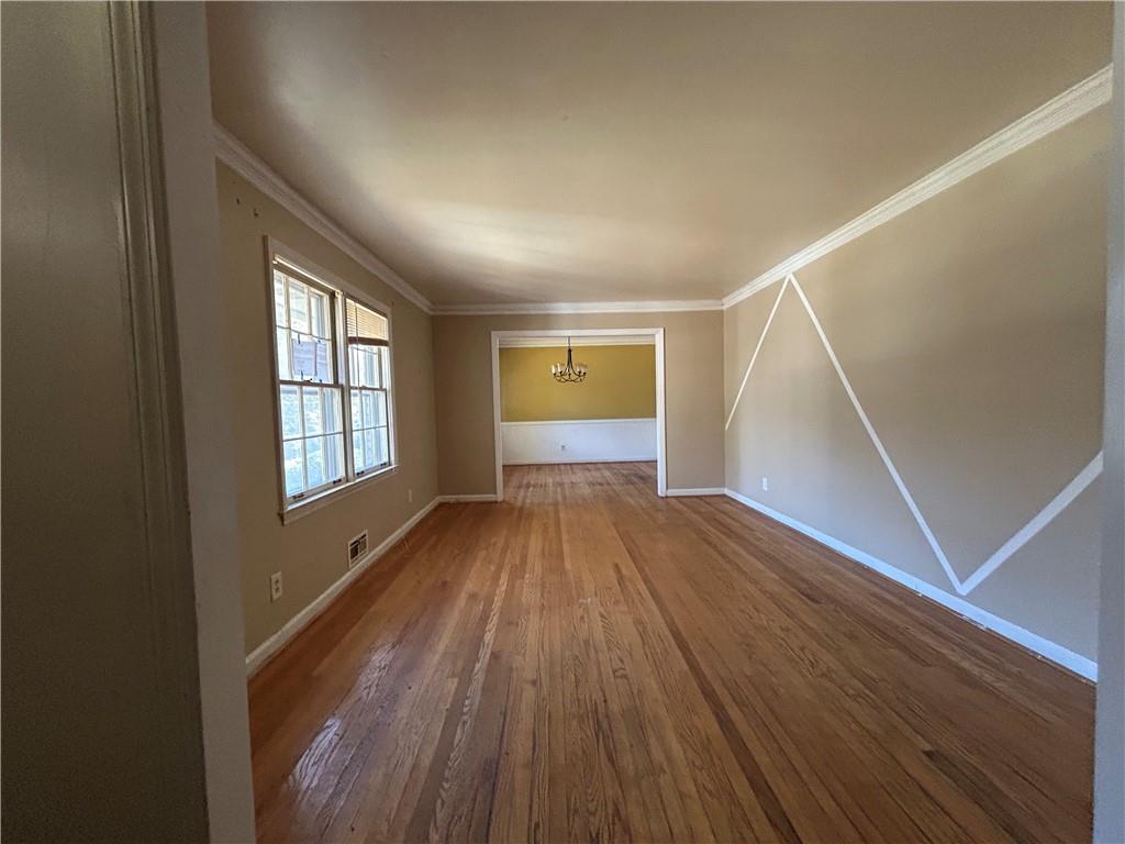 4315 York Road Atlanta, GA 30337 - Photo 6 of 24 wooden floor in an empty room with a window