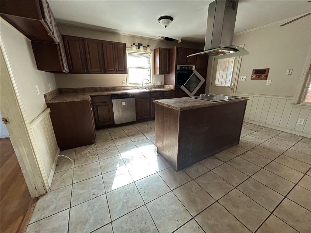 4315 York Road Atlanta, GA 30337 - Photo 10 of 24 a kitchen with granite countertop a sink a stove and cabinets
