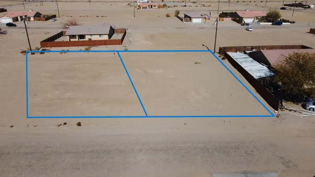 a view of tall building with ocean view