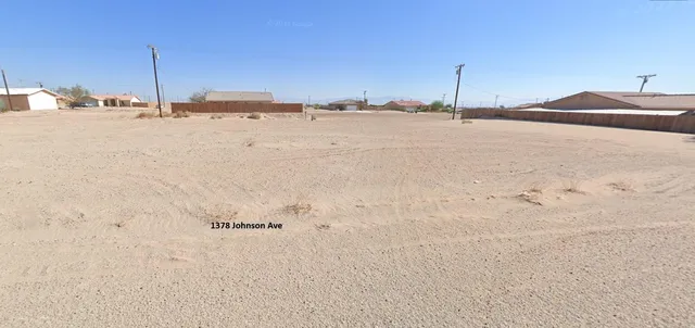 a bathroom with a blue sink and a mirror