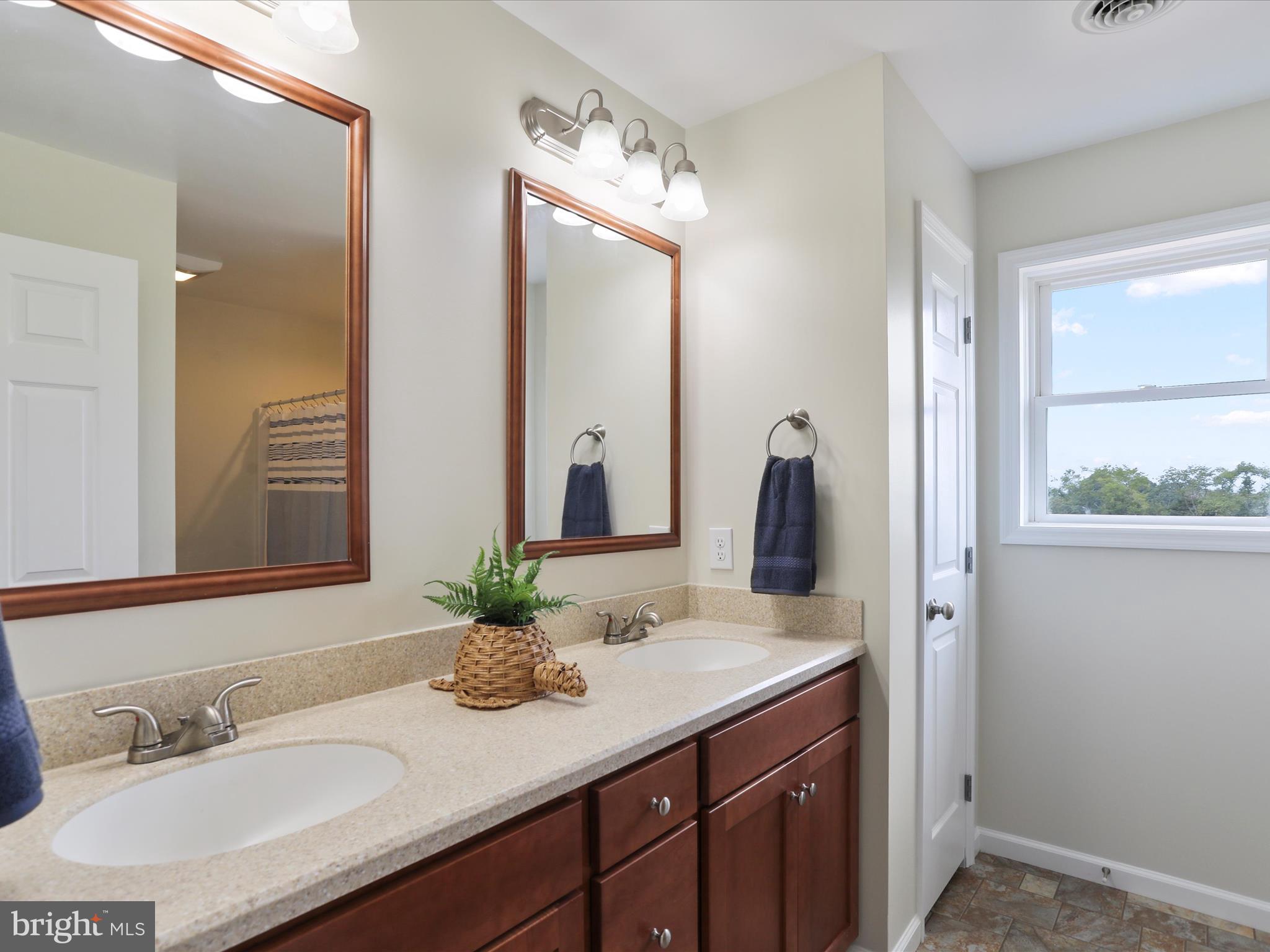 3745 Taneytown Road Gettysburg, PA 17325 - Photo 24 of 87 a bathroom with a sink and a mirror