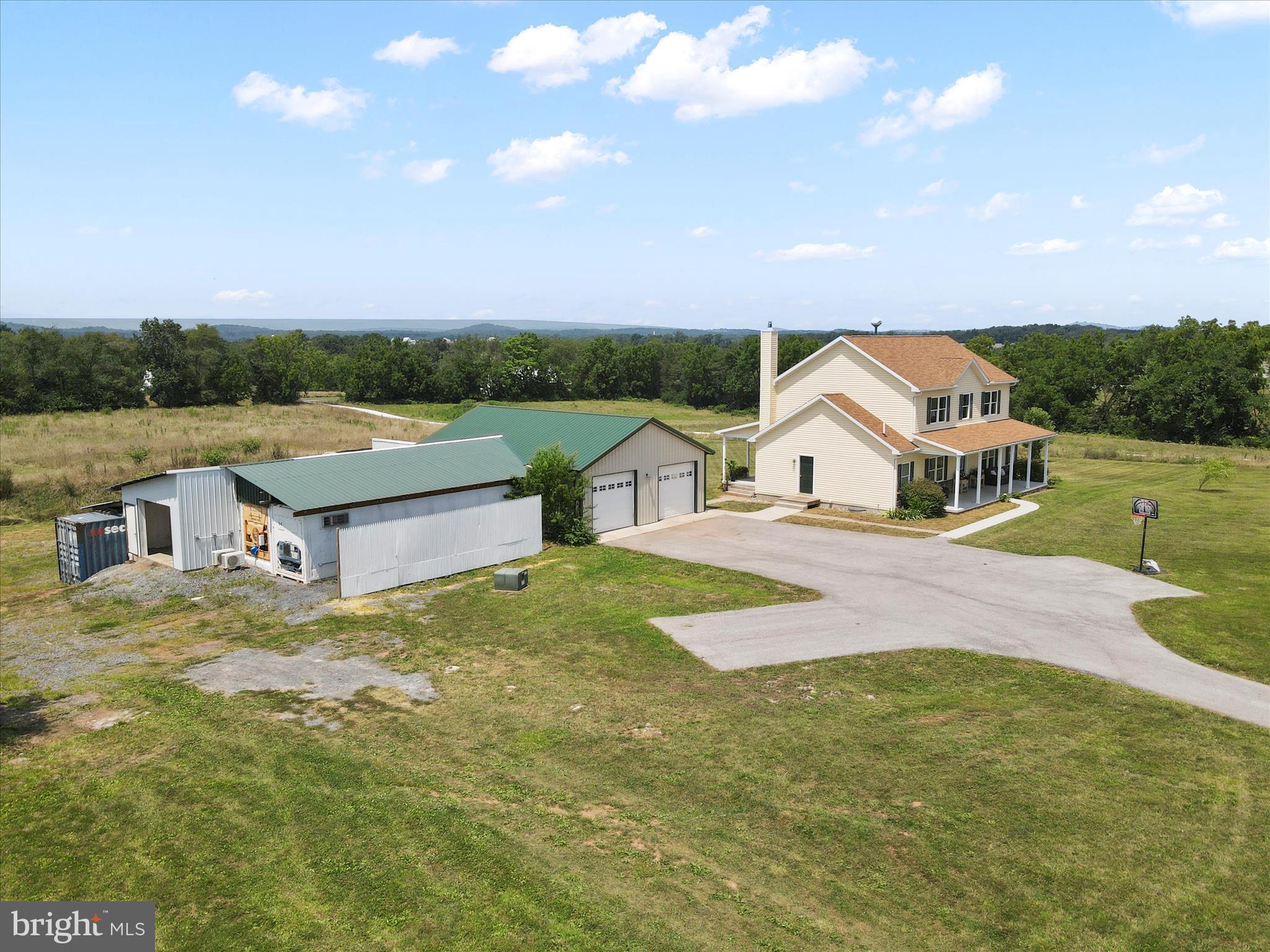 3745 Taneytown Road Gettysburg, PA 17325 - Photo 68 of 87 a aerial view of a house with swimming pool and a yard