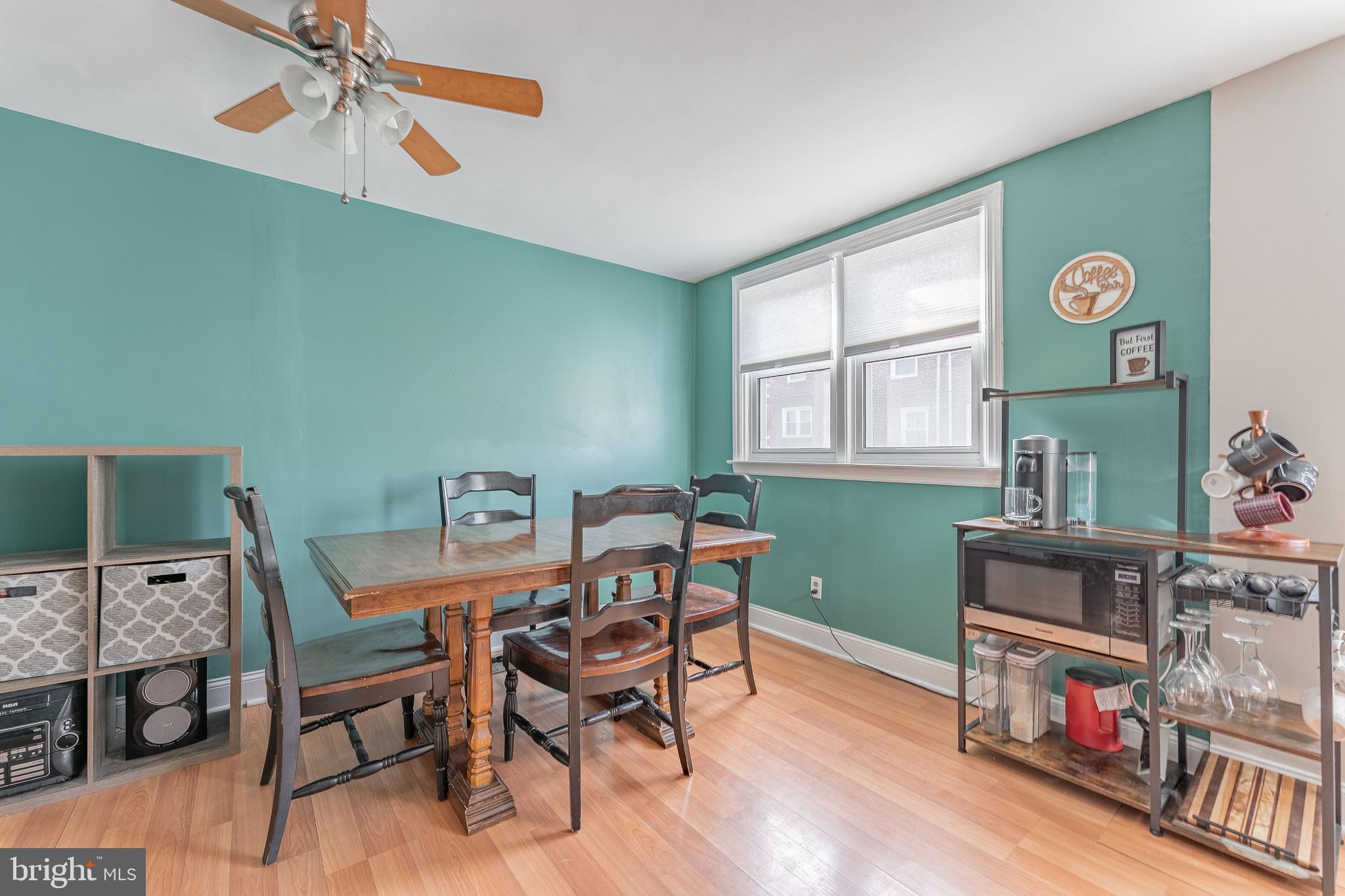 872 Fairfax Road Drexel Hill, PA 19026 - Photo 11 of 31 a dining room with a wooden floor and a window