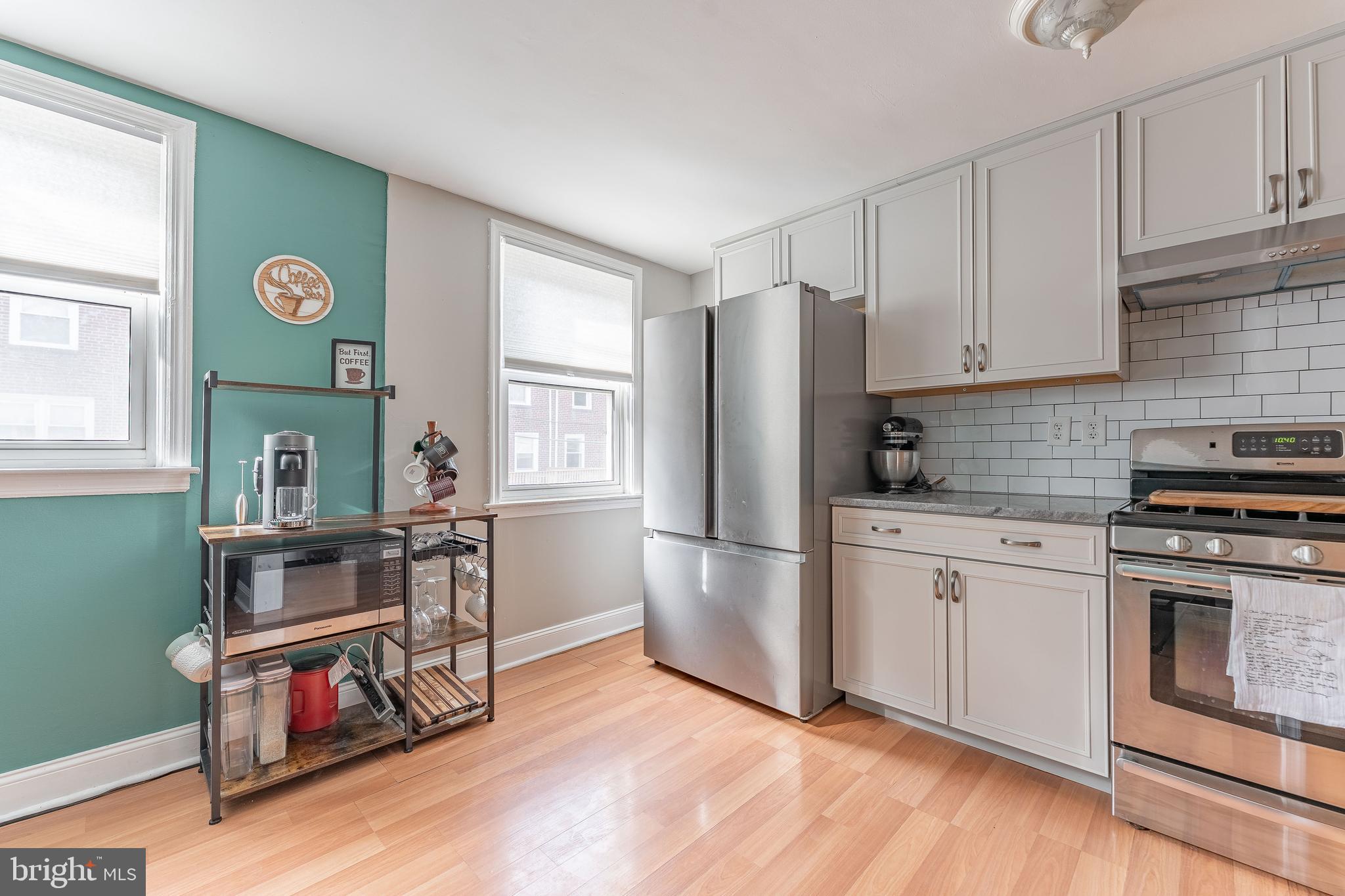 872 Fairfax Road Drexel Hill, PA 19026 - Photo 14 of 31 a kitchen with stainless steel appliances granite countertop a refrigerator stove and sink