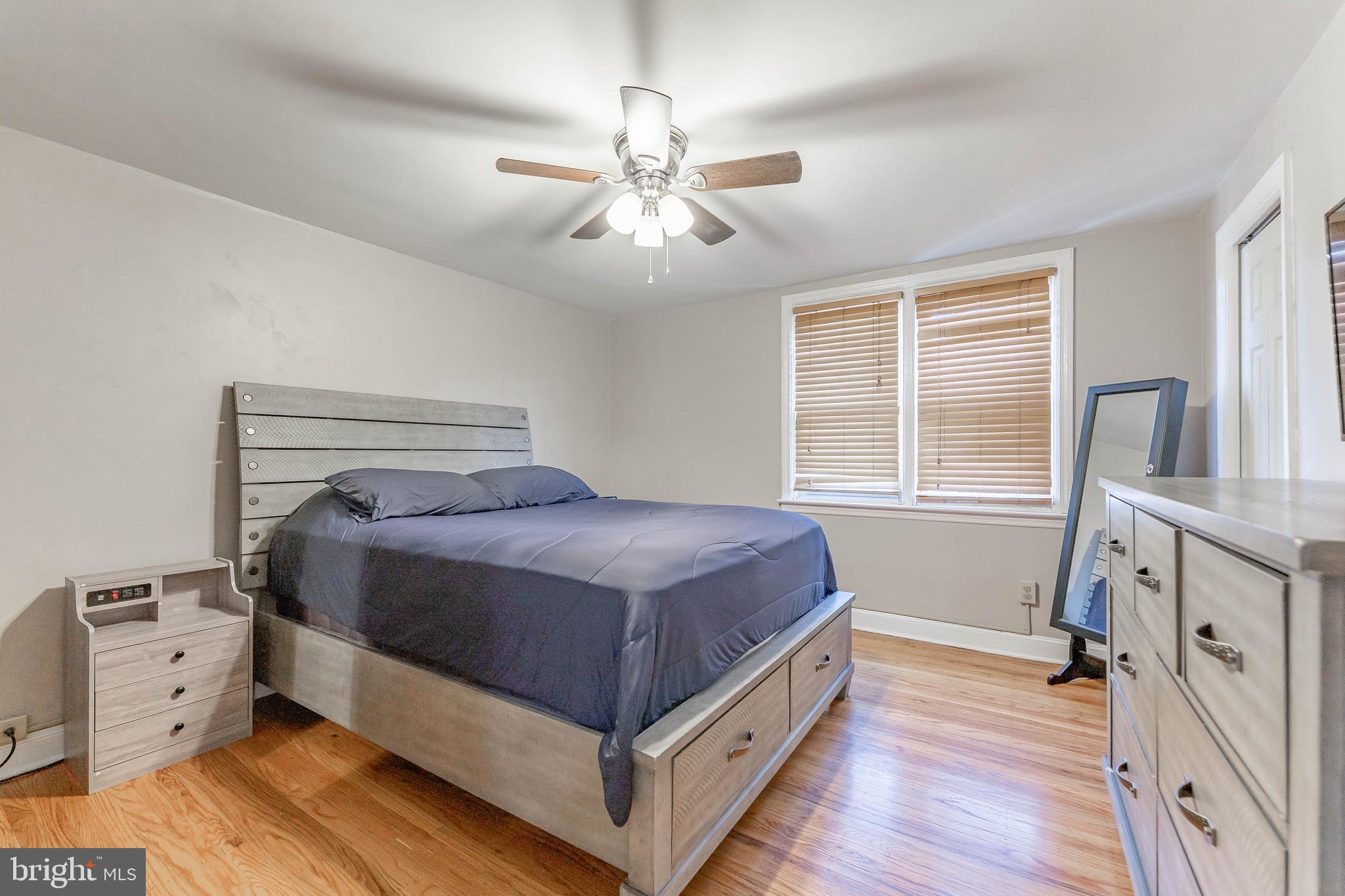 872 Fairfax Road Drexel Hill, PA 19026 - Photo 19 of 31 a bedroom with a bed and a tv on the dresser