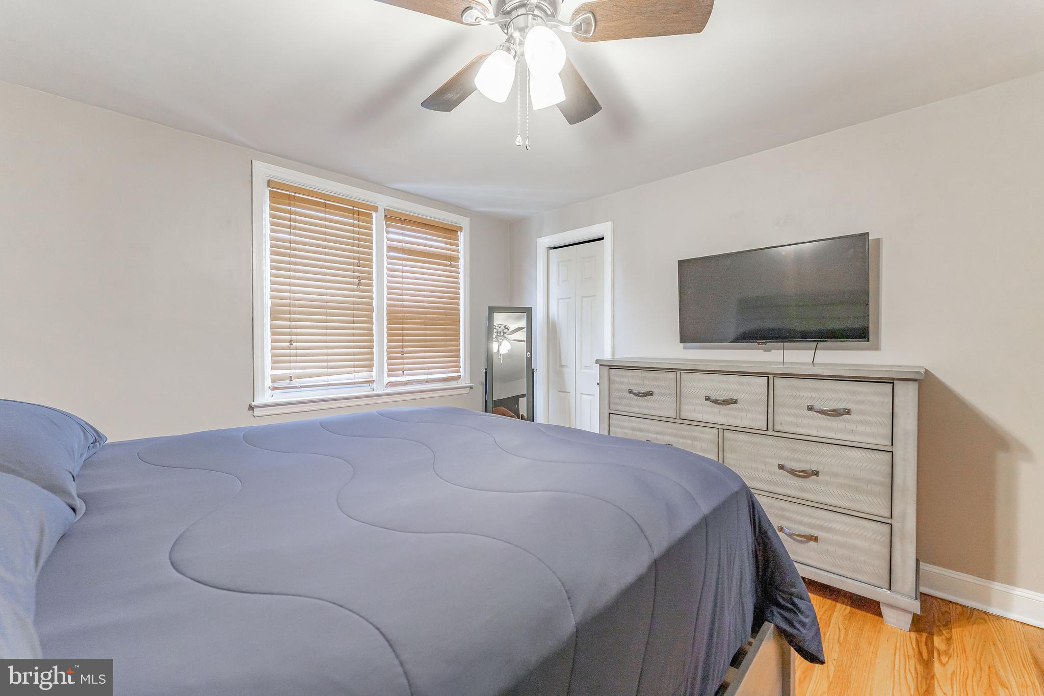 872 Fairfax Road Drexel Hill, PA 19026 - Photo 20 of 31 a bedroom with a bed and a flat screen tv