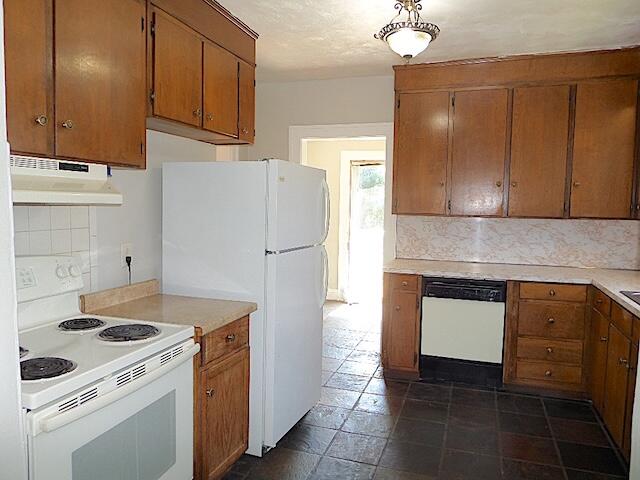 417 Fieldale Road Northeast Roanoke, VA 24012 - Photo 12 of 37 a kitchen with a stove top oven and cabinets