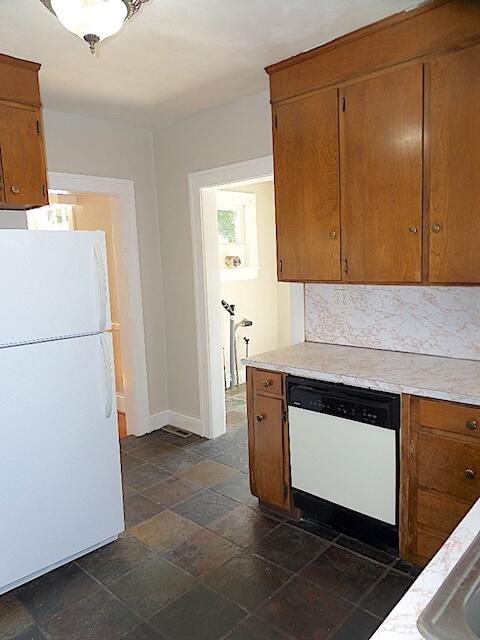 417 Fieldale Road Northeast Roanoke, VA 24012 - Photo 15 of 37 a kitchen with granite countertop cabinets and refrigerator