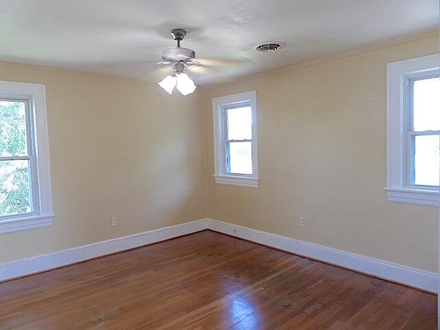 417 Fieldale Road Northeast Roanoke, VA 24012 - Photo 16 of 34 a view of a room with wooden floor and windows