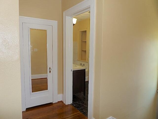 417 Fieldale Road Northeast Roanoke, VA 24012 - Photo 24 of 37 a view of a hallway with wooden floor and closet