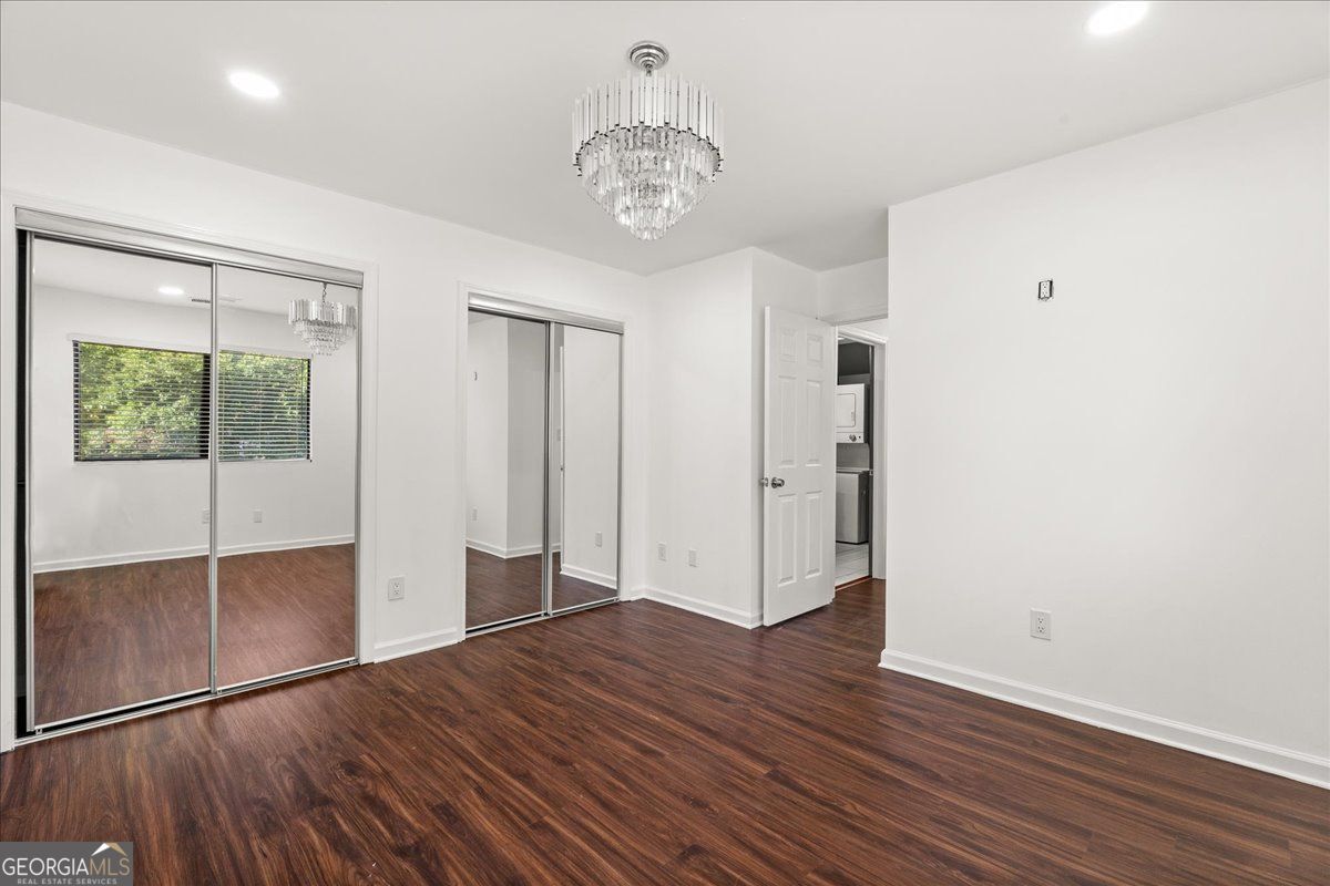 3755 Mulkey Road Marietta, GA 30008 - Photo 12 of 17 a view of entryway with wooden floor