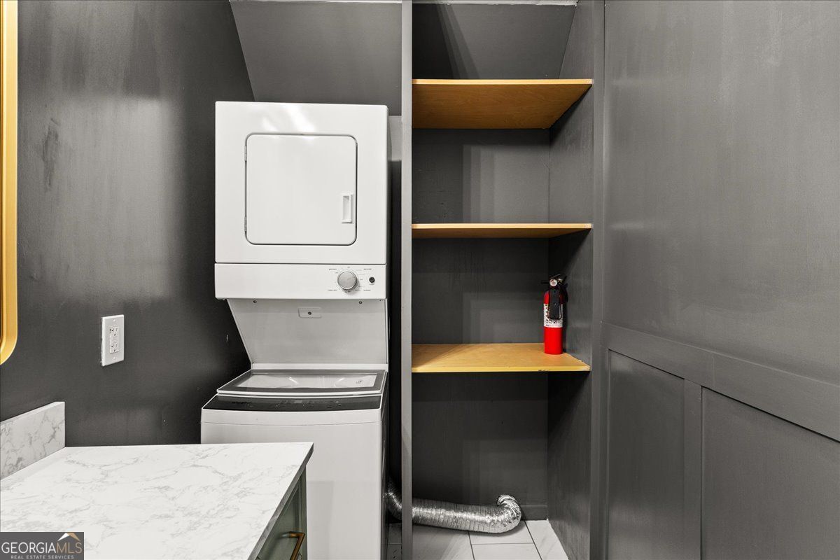 3755 Mulkey Road Marietta, GA 30008 - Photo 8 of 17 a utility room with dryer and washer