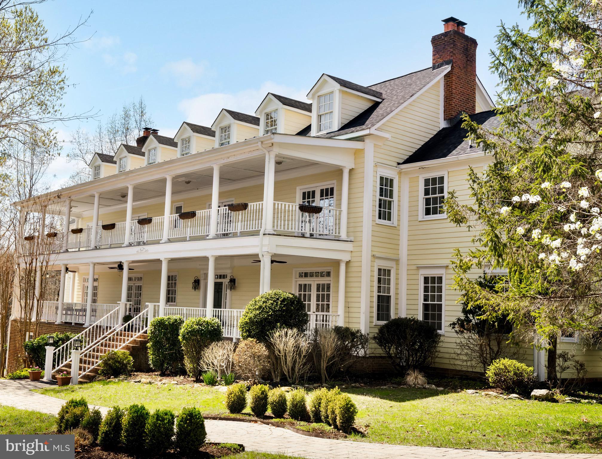 5930 Wilson Road Marshall, VA 20115 - Photo 2 of 46 a front view of a residential apartment building with a yard