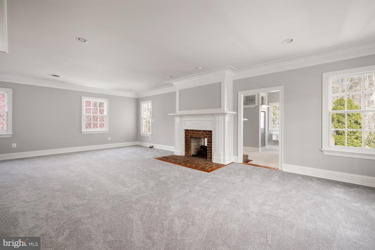 5930 Wilson Road Marshall, VA 20115 - Photo 26 of 46 an empty room with windows and fireplace
