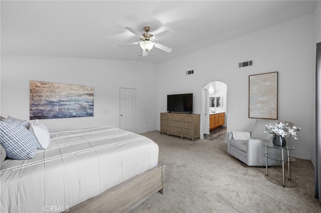 7220 Cumberland Place Rancho Cucamonga, CA 91739 - Photo 33 of 41 Spacious primary suite in the northwest corner, filled with natural light and plush carpet.