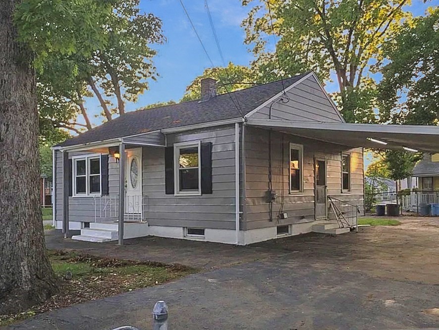 4 Cuff Avenue Springfield, MA 01104 - Photo 1 of 24 a view of a house with a yard