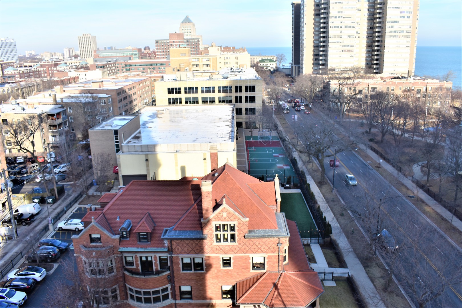 6166 North Sheridan Road, Unit 10D Chicago, IL 60660 - Photo 23 of 23 a view of a city with tall buildings