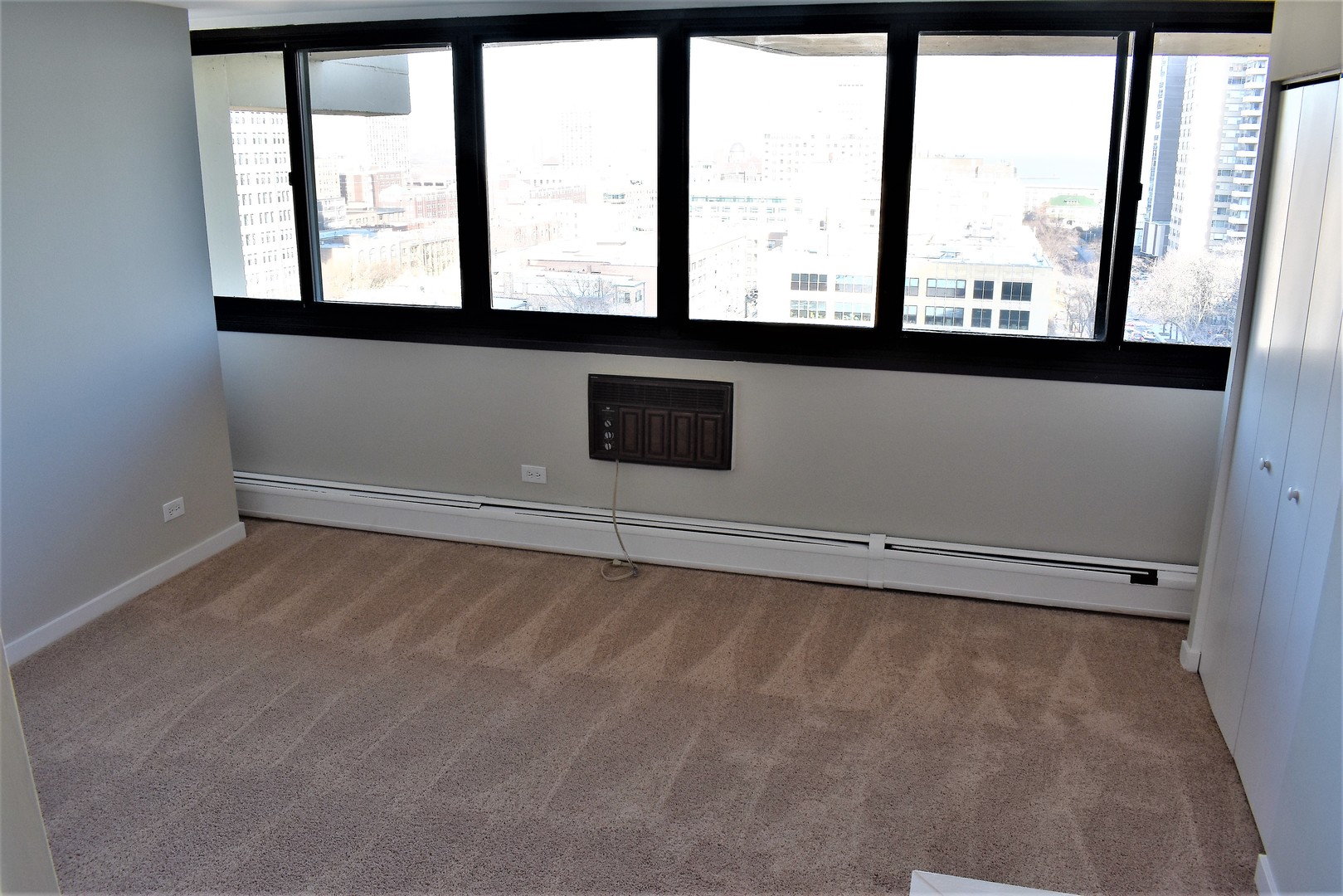 6166 North Sheridan Road, Unit 10D Chicago, IL 60660 - Photo 9 of 23 a view of a window in an empty room