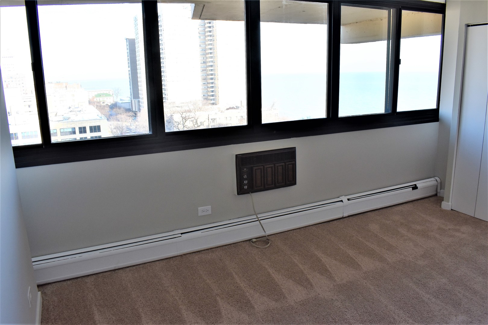 6166 North Sheridan Road, Unit 10D Chicago, IL 60660 - Photo 10 of 23 a view of a window in an empty room