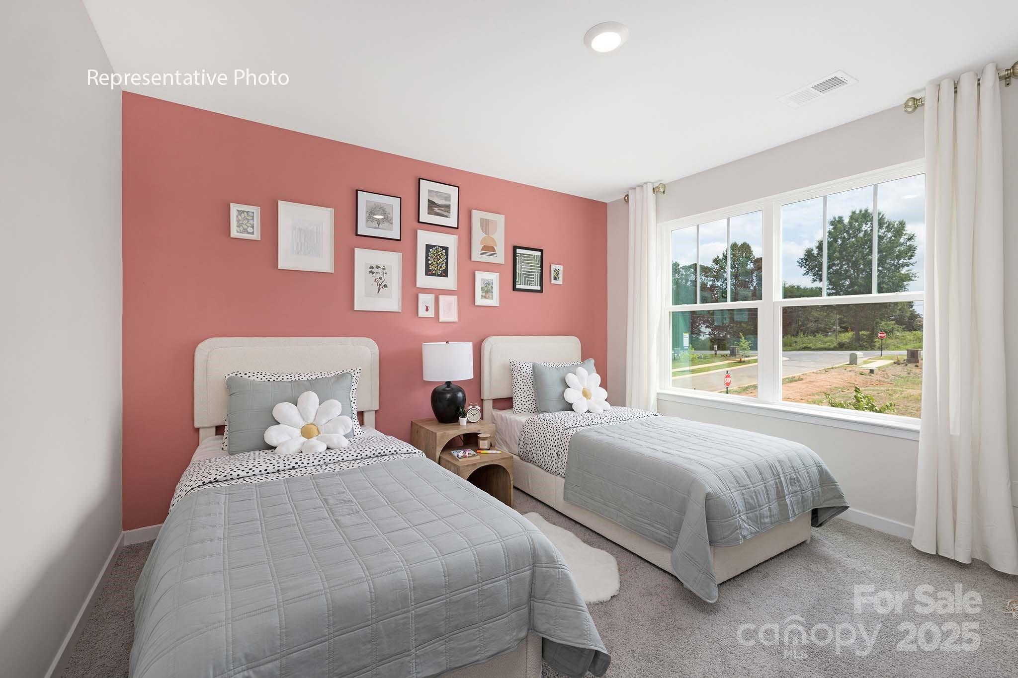 2683 Goose Fair Road Maiden, NC 28650 - Photo 13 of 22 a bedroom with two beds and next to a window