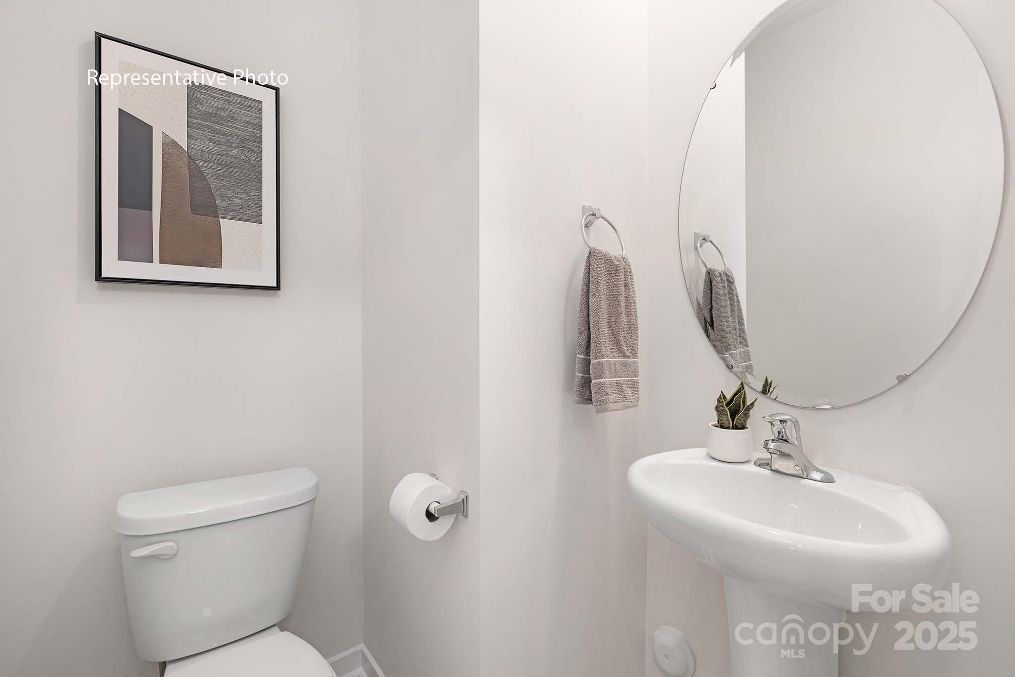 2683 Goose Fair Road Maiden, NC 28650 - Photo 20 of 22 a bathroom with a toilet sink and mirror