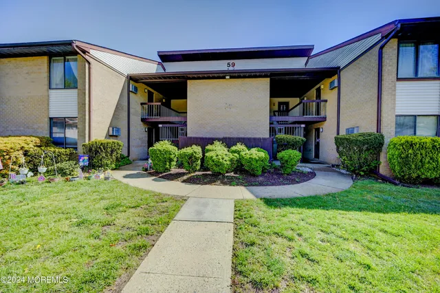 a view of backyard with garden and plants