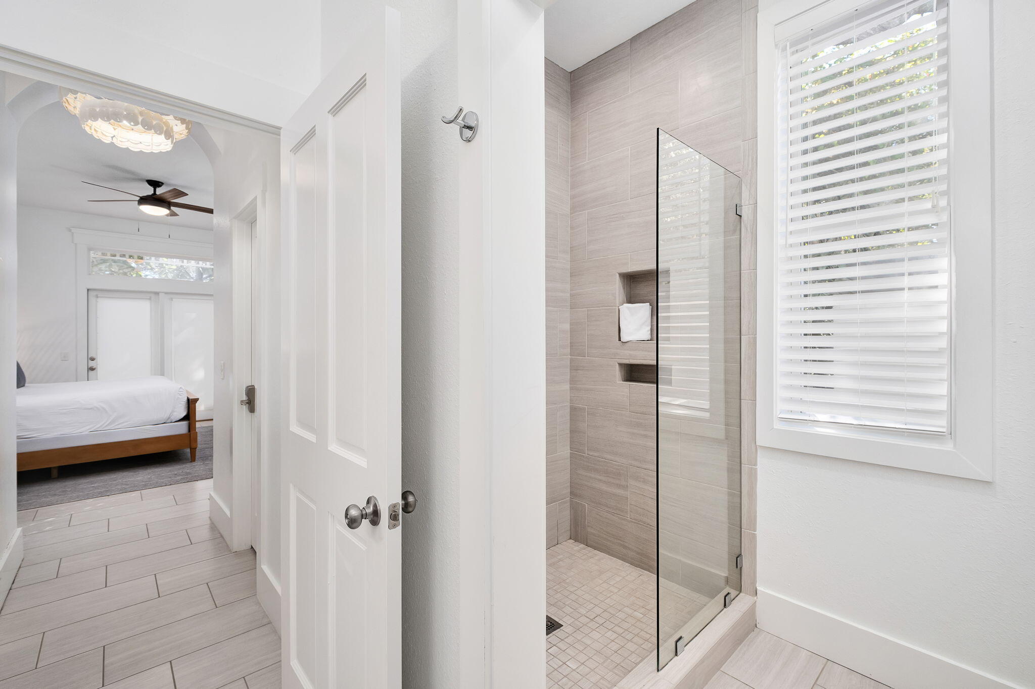3319 East County Highway 30A Santa Rosa Beach, FL 32459 - Photo 17 of 44 a bathroom with a tub and shower