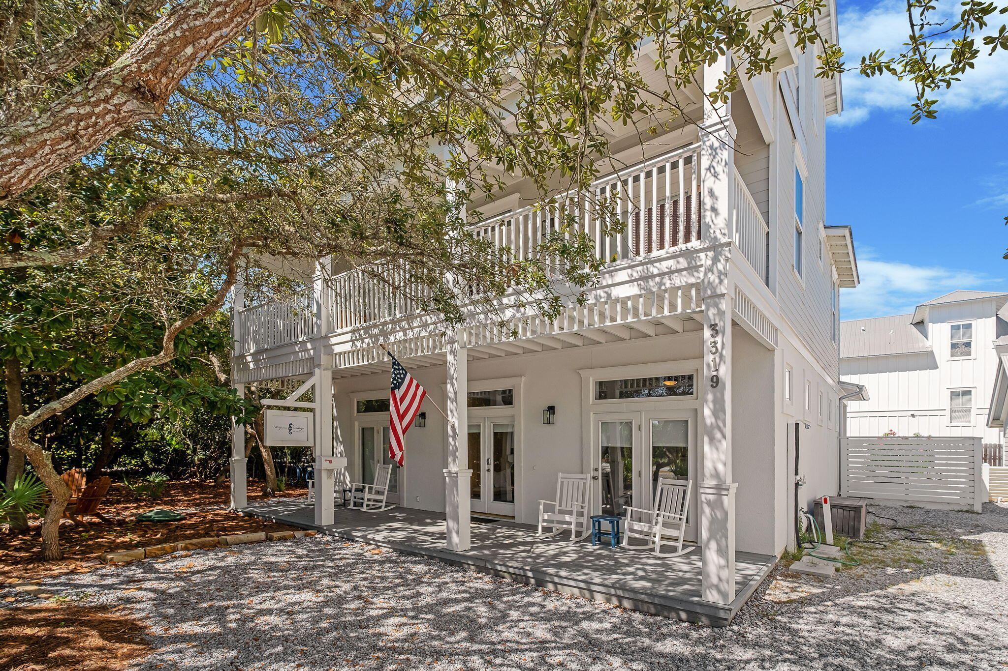 3319 East County Highway 30A Santa Rosa Beach, FL 32459 - Photo 23 of 44 a view of a building with a tree