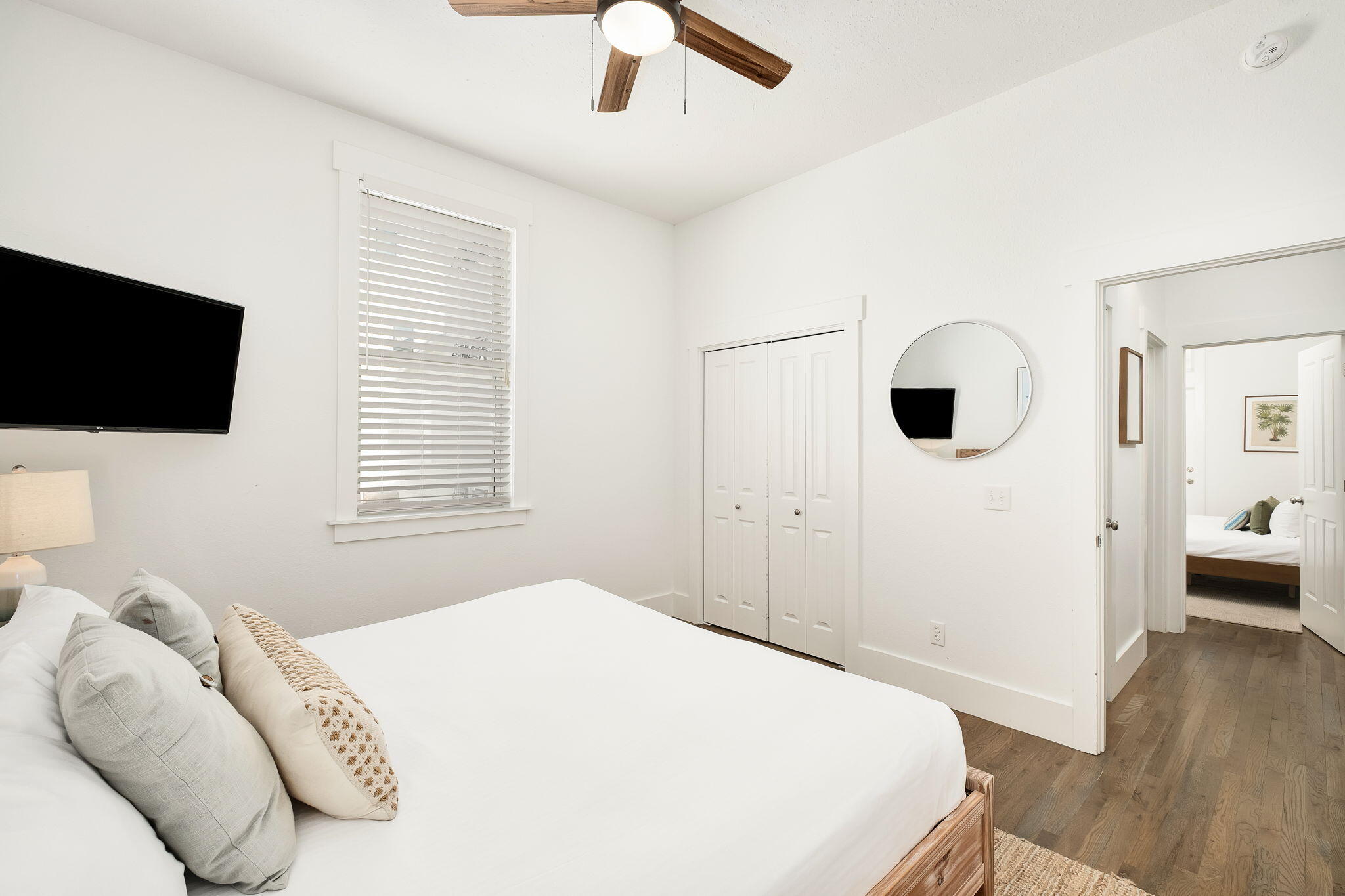 3319 East County Highway 30A Santa Rosa Beach, FL 32459 - Photo 27 of 44 a bedroom with a bed and a flat screen tv