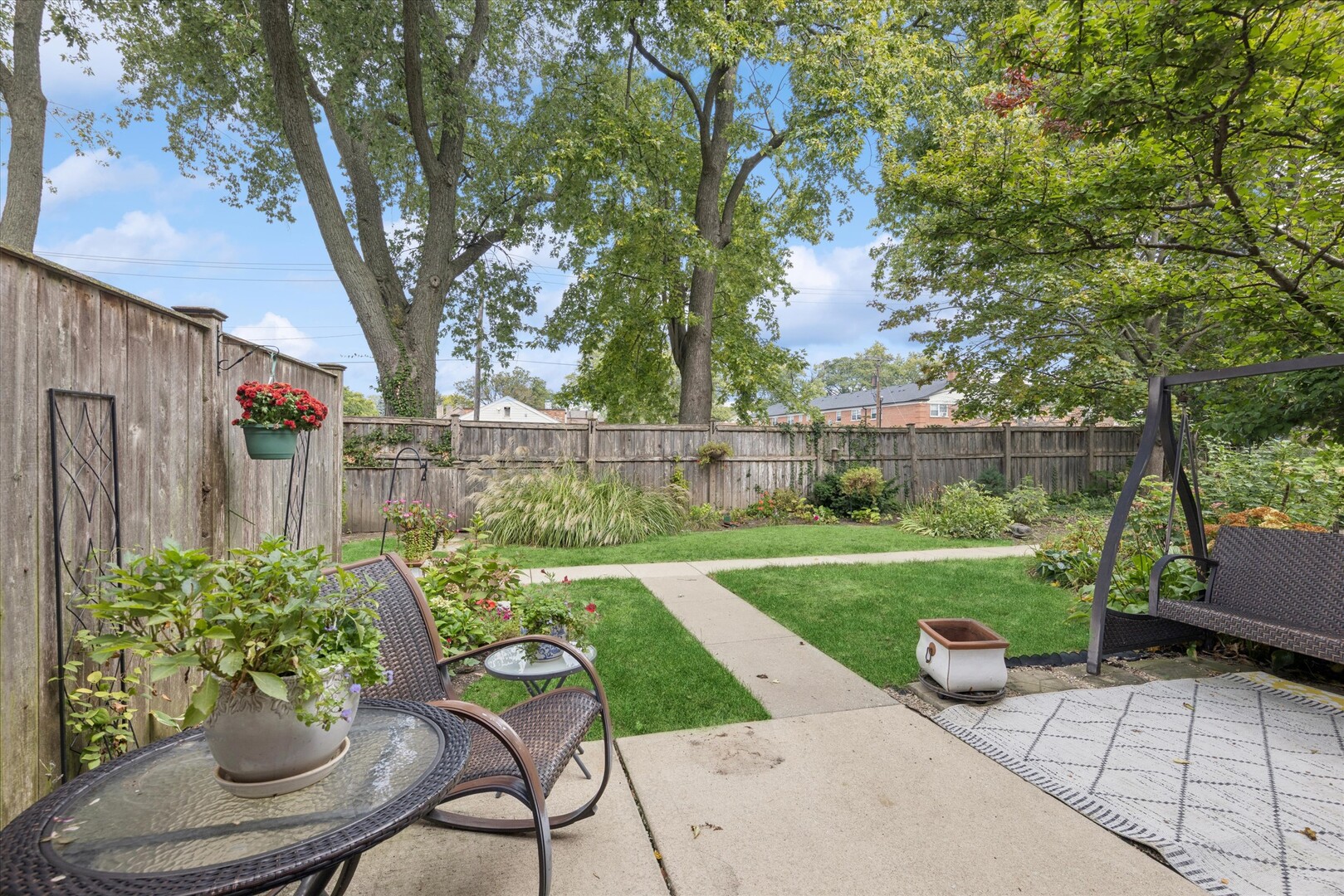 494 Old Surrey Road Hinsdale, IL 60521 - Photo 17 of 21 a view of a backyard with sitting area and furniture