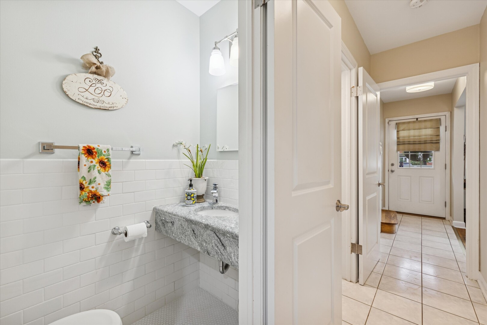 494 Old Surrey Road Hinsdale, IL 60521 - Photo 9 of 21 a bathroom with a sink mirror and vanity