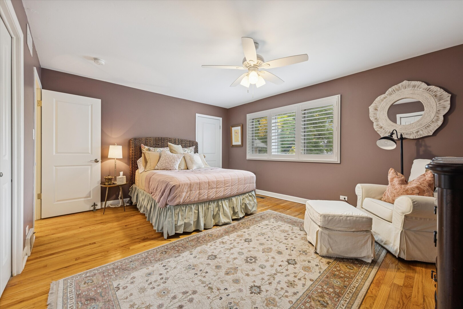 494 Old Surrey Road Hinsdale, IL 60521 - Photo 10 of 21 a bedroom with a bed and wooden floor