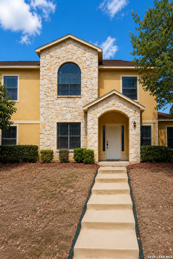 6160 Eckhert Road, Unit 804 San Antonio, TX 78240 - Photo 2 of 38 a front view of a house with yard