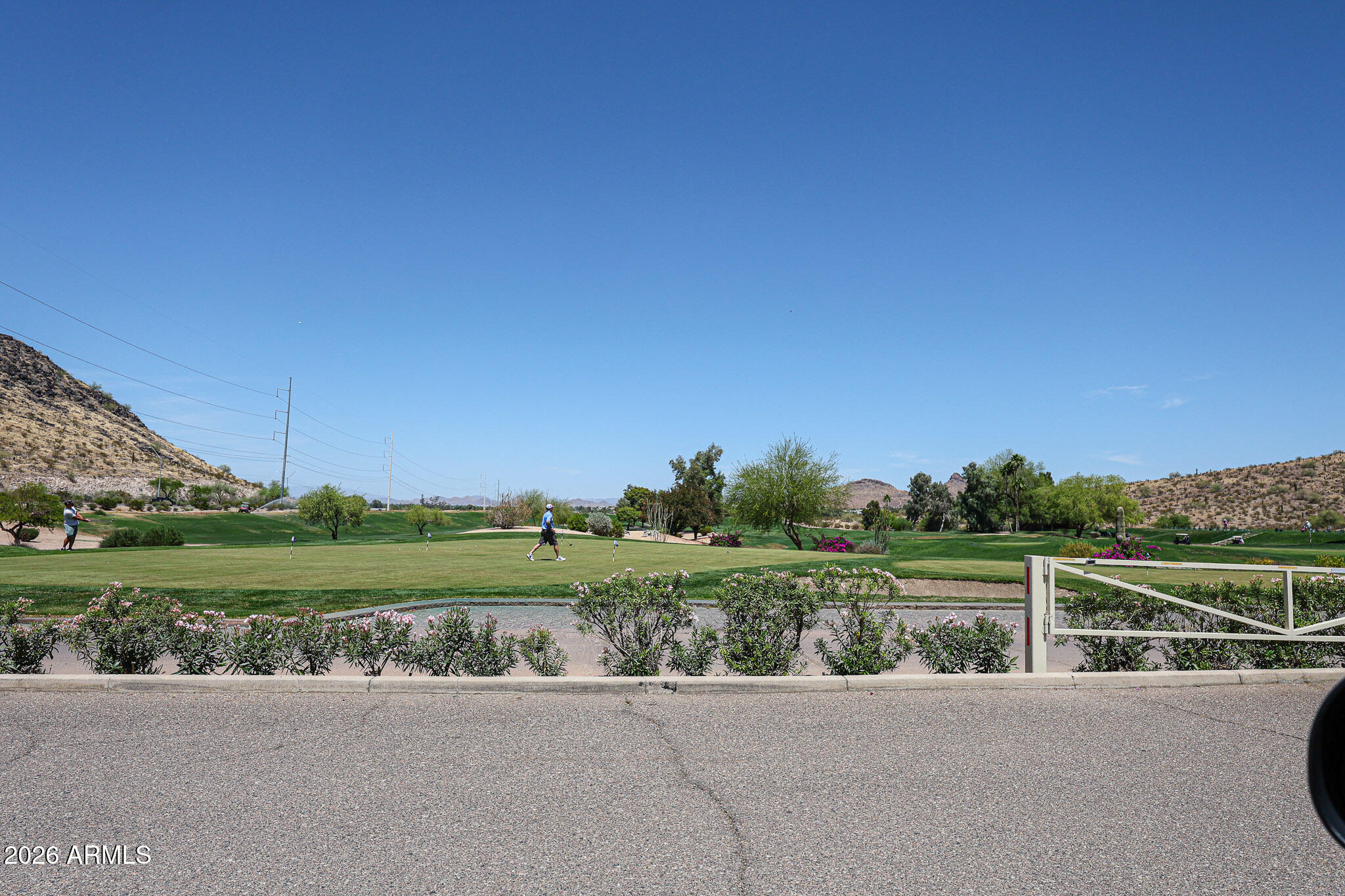 10410 North Cave Creek Road, Unit 1011 Phoenix, AZ 85020 - Photo 43 of 54 a view of a street with a big yard