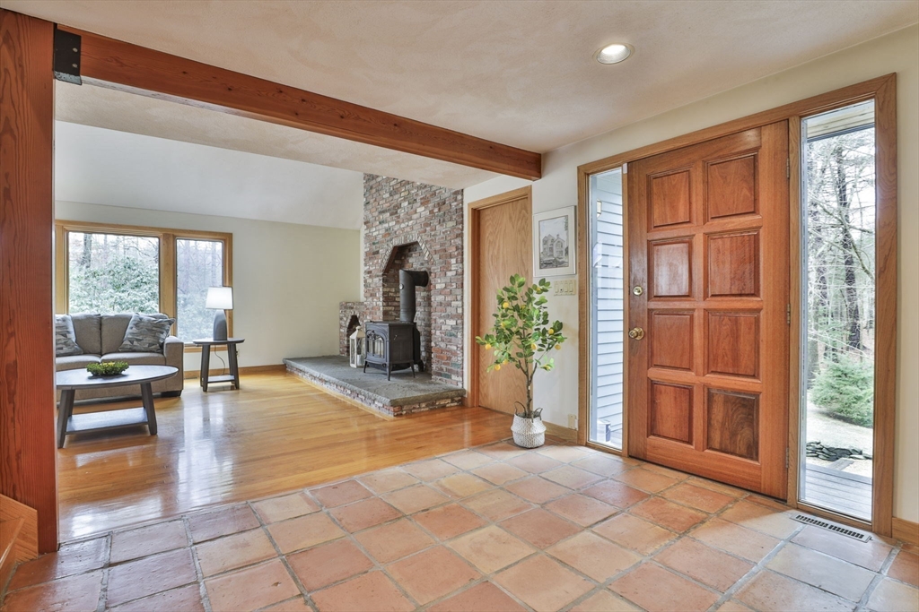 35 Eldridge Road Harvard, MA 01451 - Photo 18 of 39 a view of livingroom with furniture staircase and windows