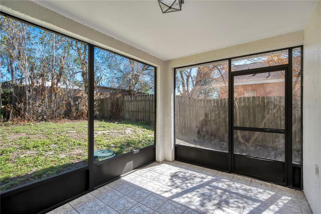 1537 Rivers Edge Drive Orlando, FL 32825 - Photo 21 of 30 a view of a room with a large window