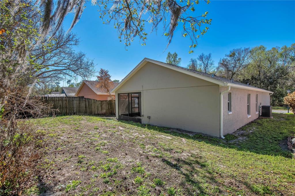 1537 Rivers Edge Drive Orlando, FL 32825 - Photo 24 of 30 a view of a house with a yard
