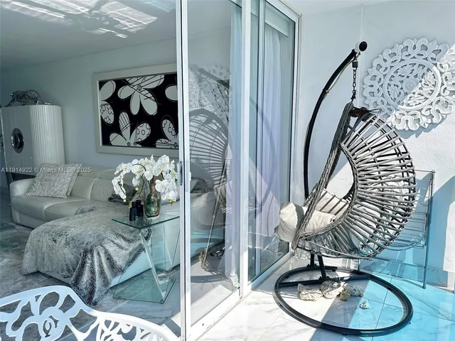 a living room with granite countertop furniture and a fireplace