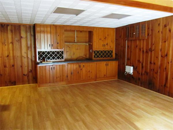 18 Constitution Road Lexington, MA 02421 - Photo 9 of 11 a view of a room with wooden walls
